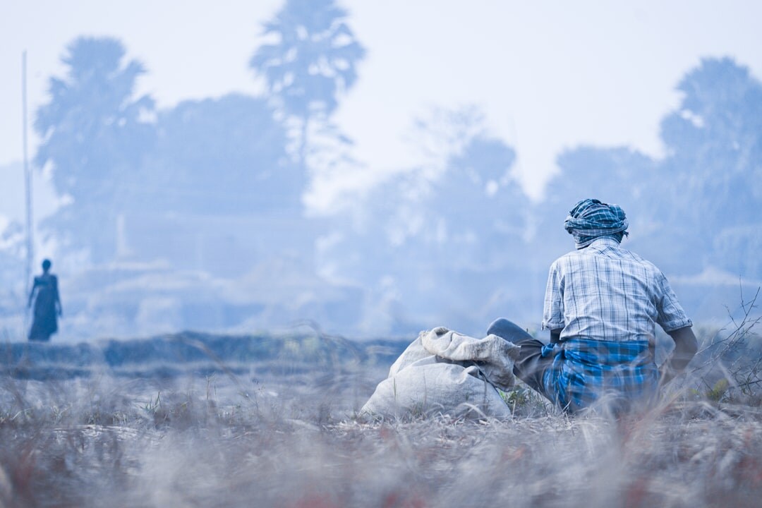 farmer in field at dawn