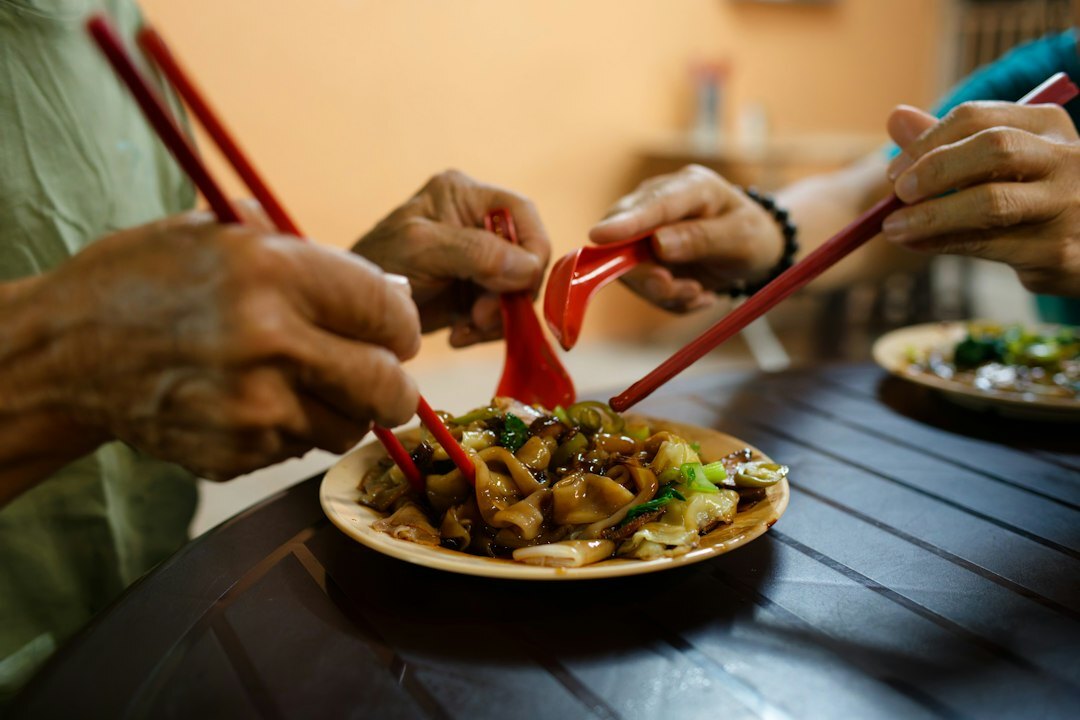 elderly people sharing meal